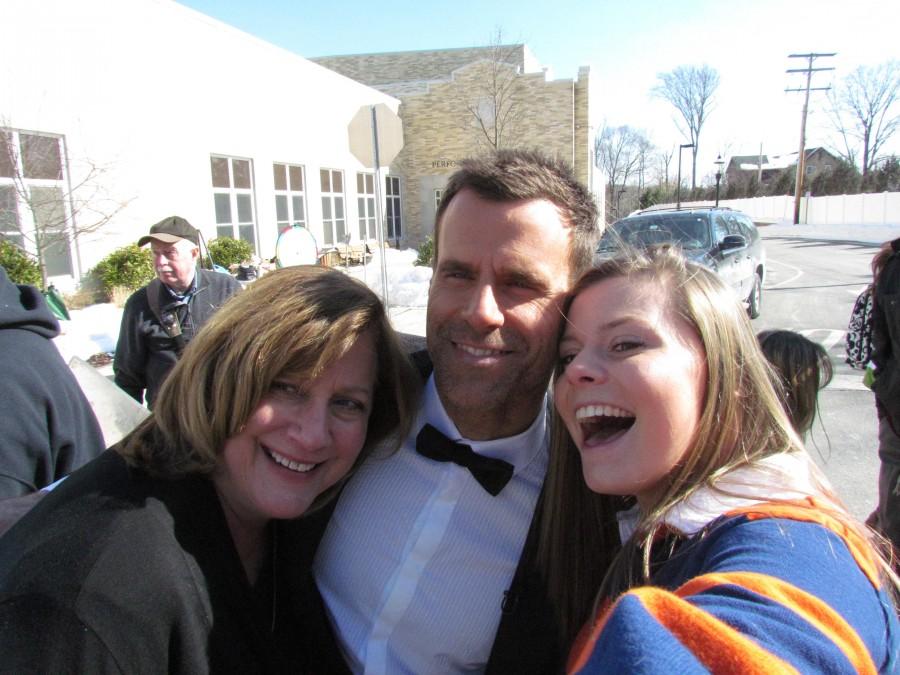 Senior Erika Evelth takes a picture with secretary Mrs. Nickel and Cameron Mathison.