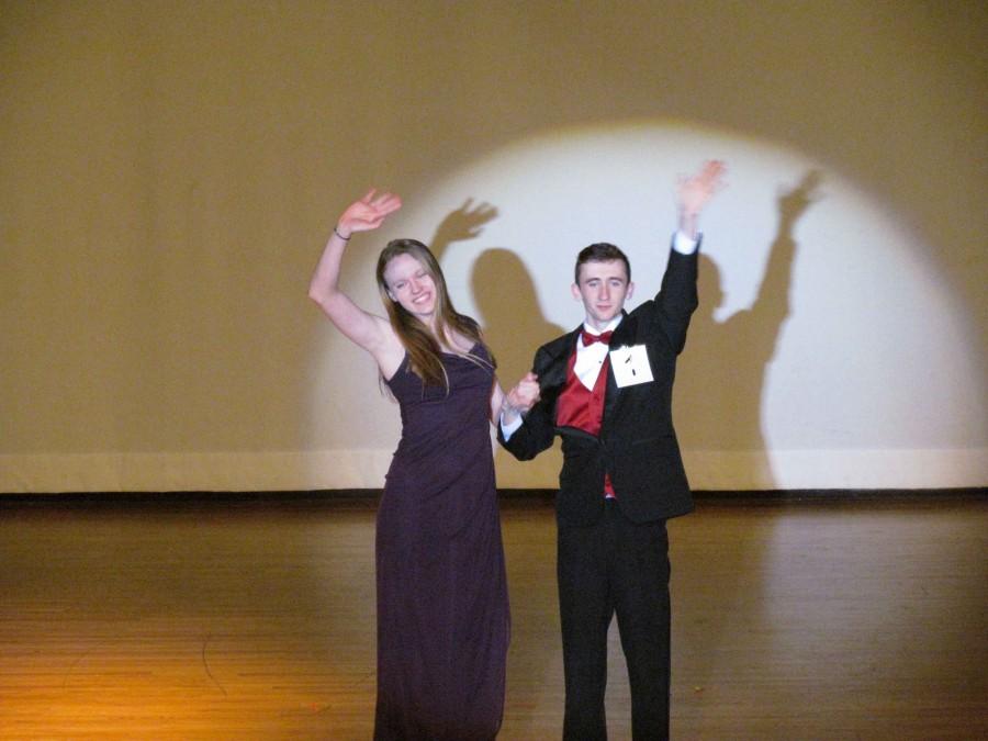 Connor Mcshane and his escort Tatiana Prendella wave to the crowd. 