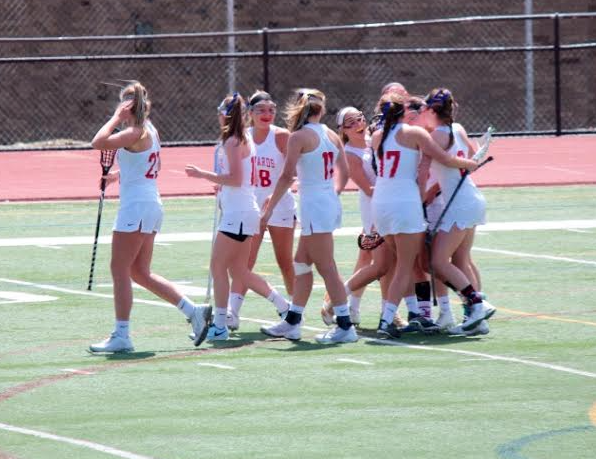 The team celebrates after a goal. 