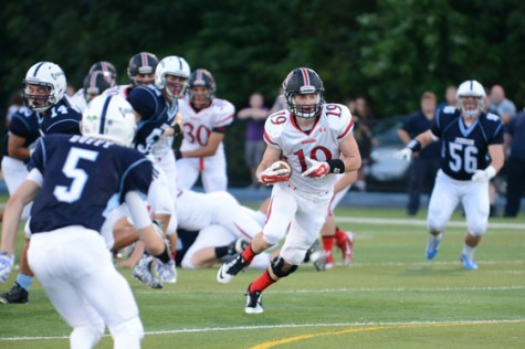 Senior Griffin McParland runs with the ball. 