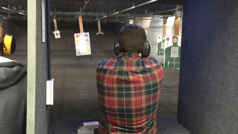 Jake Rosen shoots a Glock at a gun store in Provo, Utah