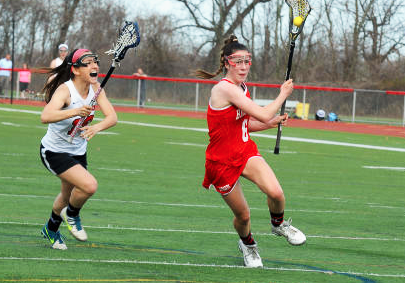 Junior Paige Petty (right) avoids a defender