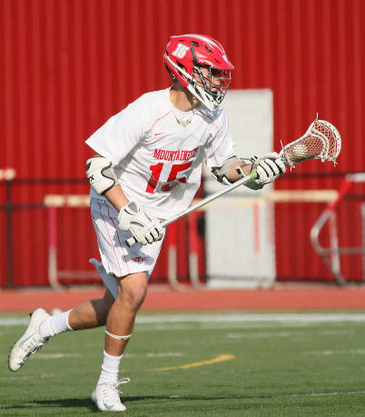 Sophomore Jack Warren cradles the ball