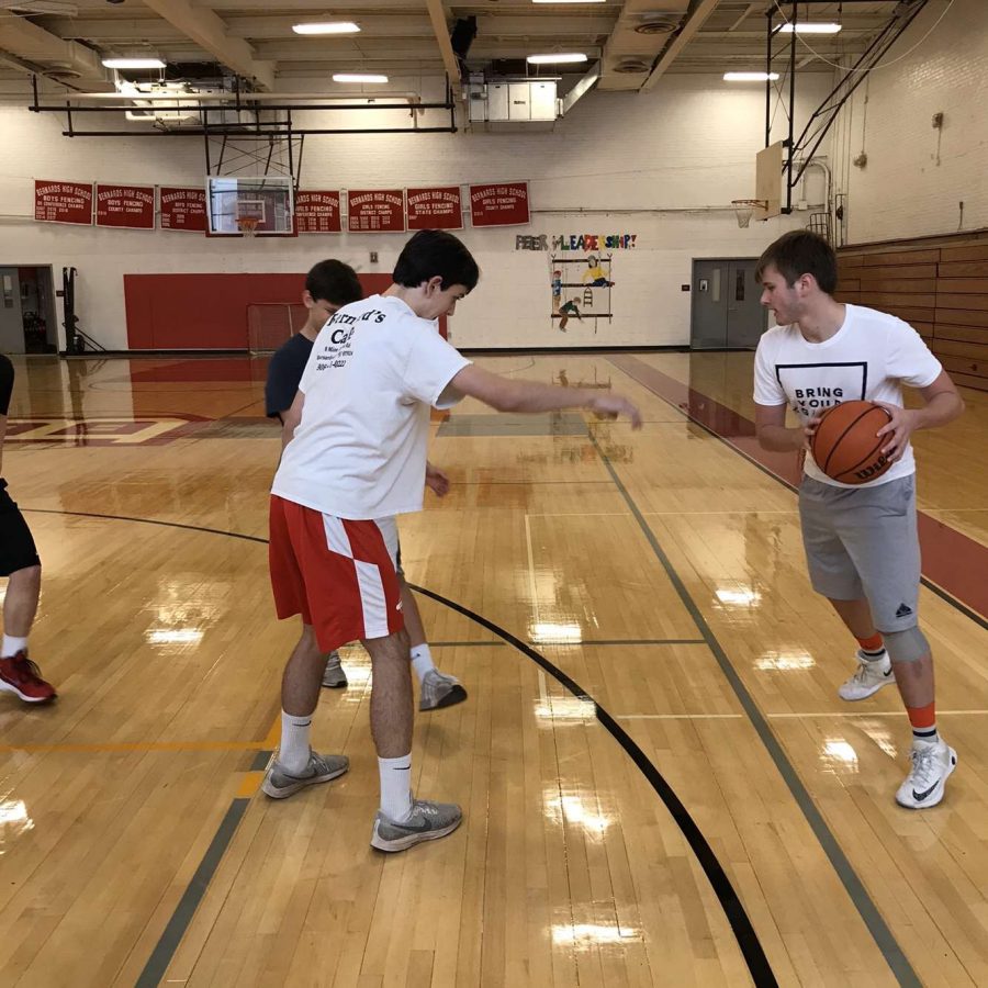 Tyler Stevenson 21 looks to score in week 1 of intramural basketball