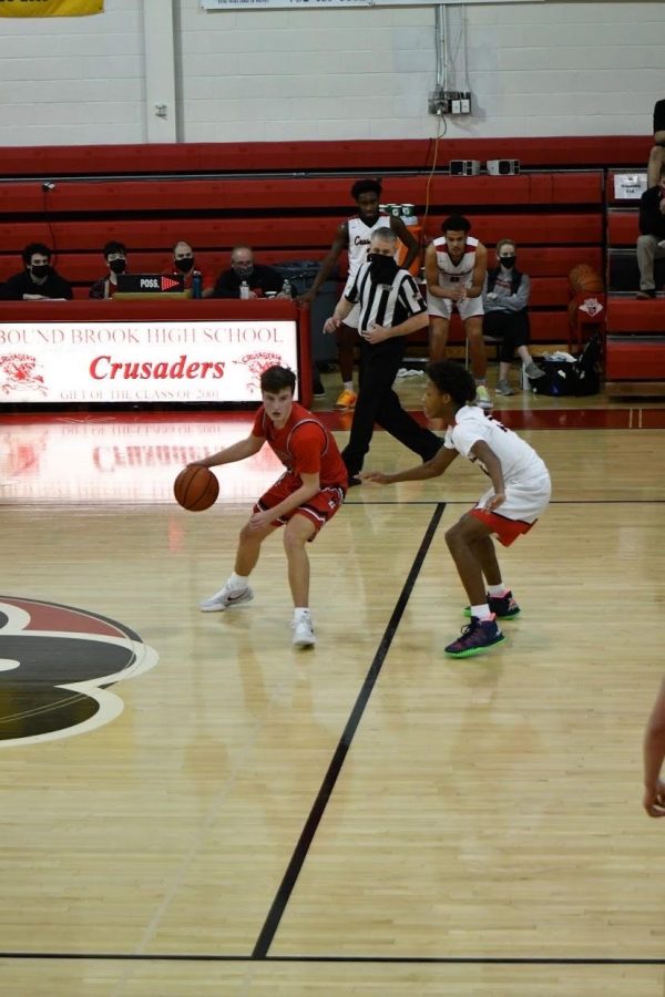 Senior Vincent White dribbling against Bound Brook