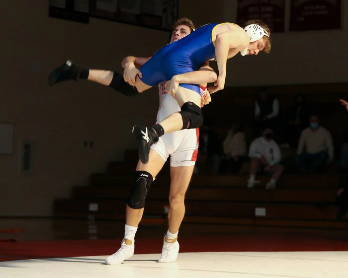 Senior Tyler Austin shooting a shot on an opponent