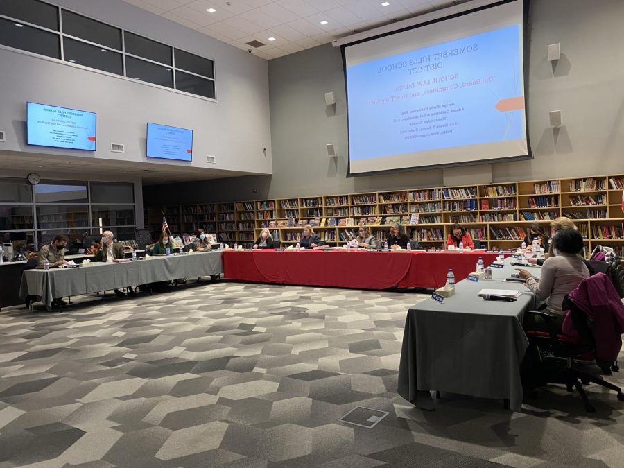 The board members meeting table during the monthly public meeting