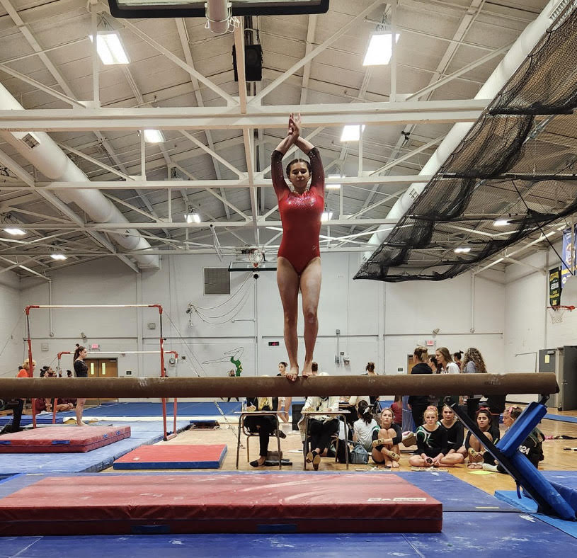 Emma Incarnato competing at the SCIAA Gymnastics competition this fall