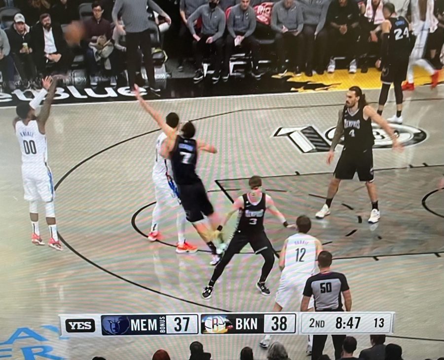 Nets’ Royce O’Neale shooting a 3 pointer
against the Grizzlies