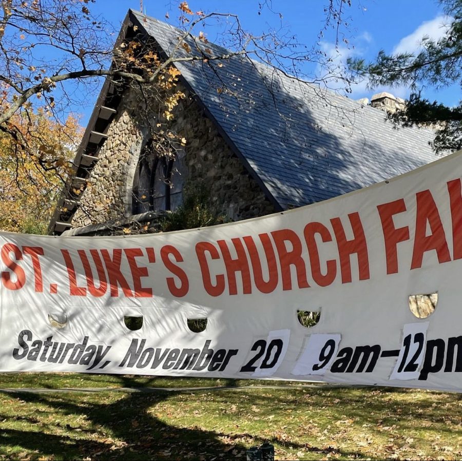 St. Lukes advertises their Christmas fair to the community with dates and times via banner