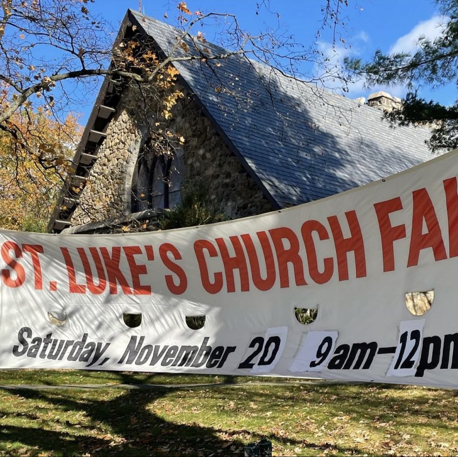 St. Luke's advertises their Christmas fair to the community with dates and times via banner