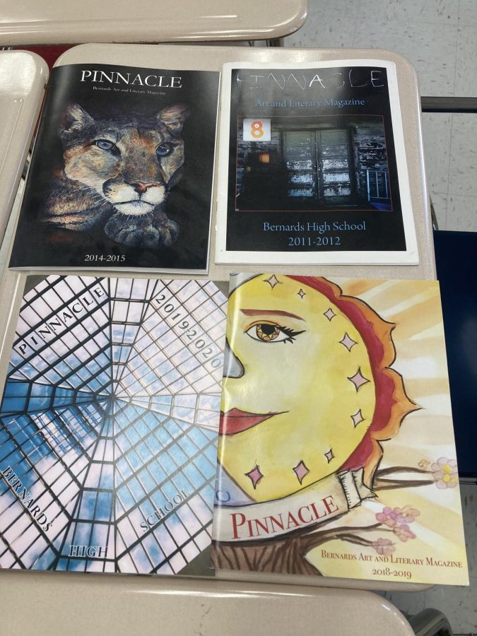 Four covers of previous issues of the Pinnacle at Bernards High school