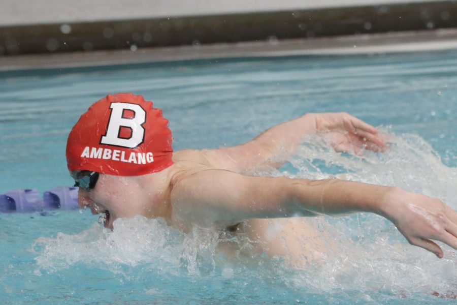 Junior Thomas Ambelang in a meet last season for the Swimming team