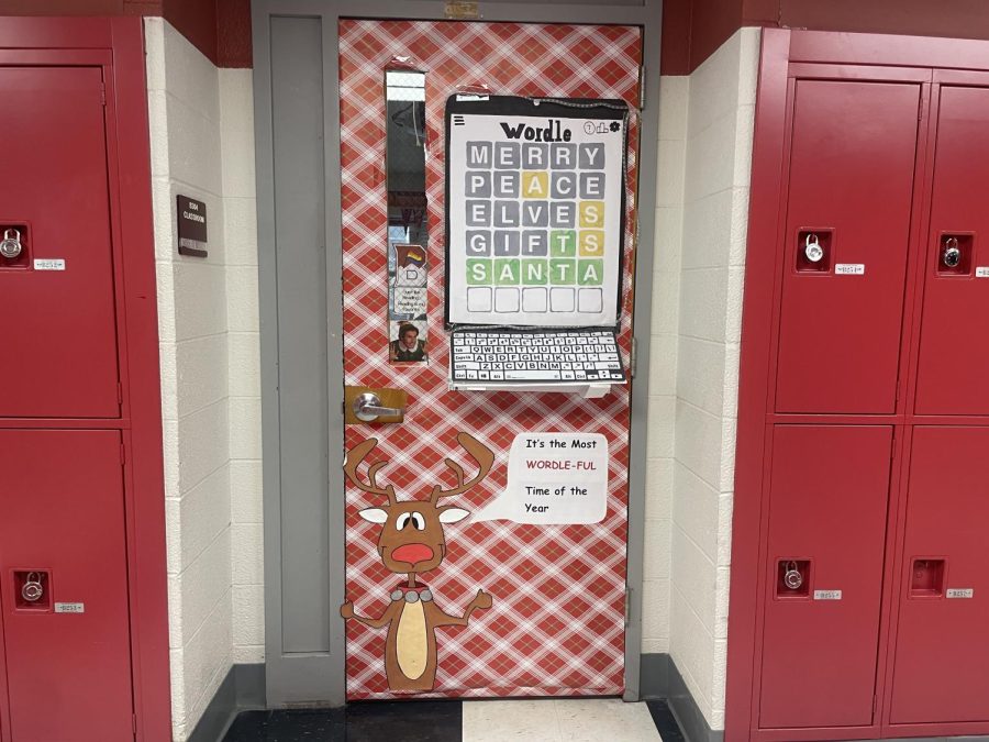 Mrs. OBrien and students worked together to decorate her door with a wordle theme for the holidays.