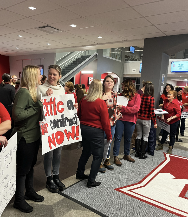 Teachers Protest their contracts at entrance to January Board Meeting 