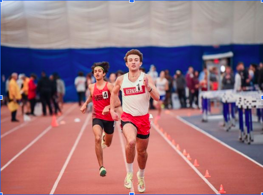 Senior Patrick Griffin finishes across the 800 meter race as champion