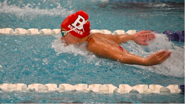 Senior Sami Bender racing in the 100 free in the regular season