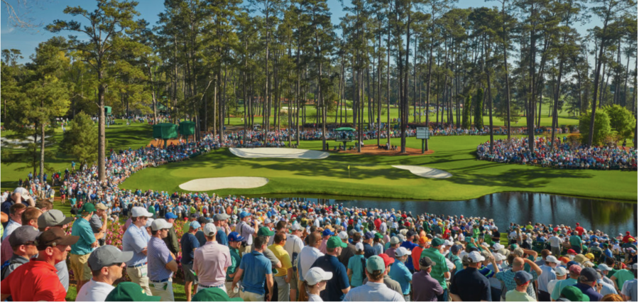 spectators waiting at the green of the famous sixteenth hole