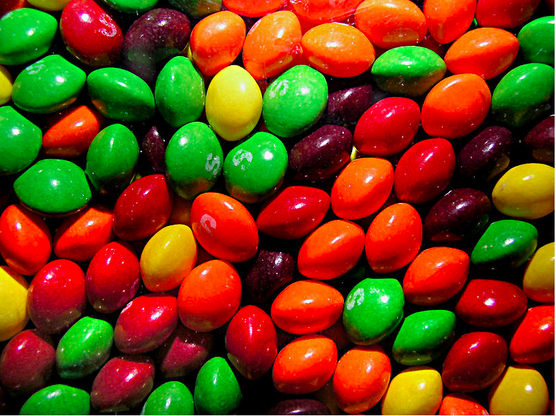 Assortment of original flavored rainbow skittles. Debate to ban in the state of CA continues