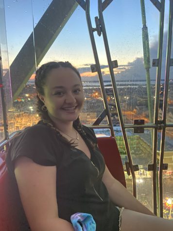 Summer Schnabolk smiles while on a Ferris wheel after visiting her College 