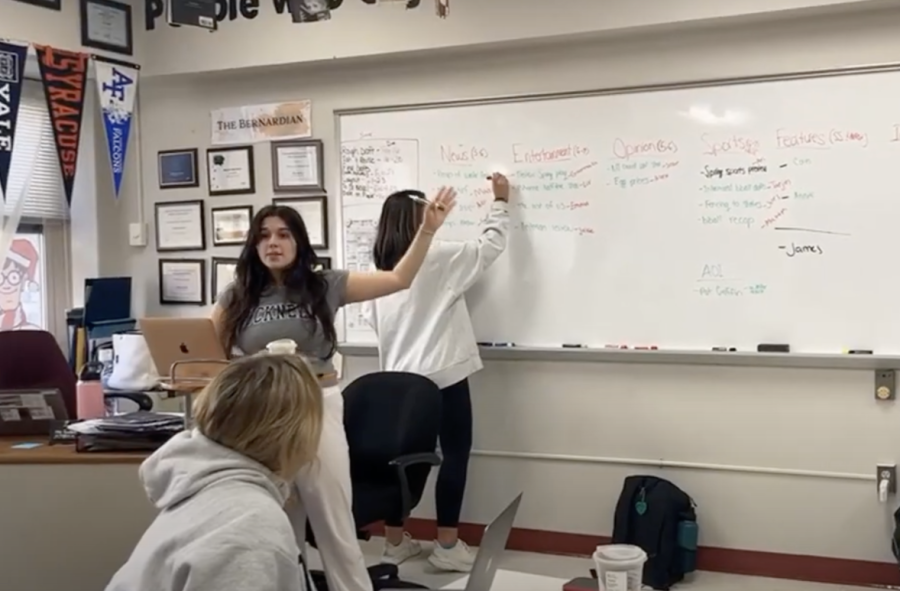 Sydney Kaul and Jane Holmes conducting an Article idea meeting 