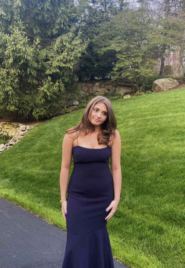 Sophia Vascallero is photographed before junior prom in her dress