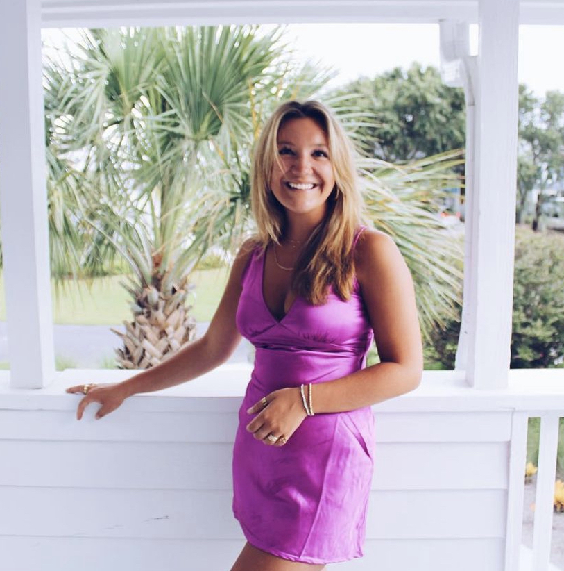 Scarlett Campbell poses in South Carolina on a balcony of a home