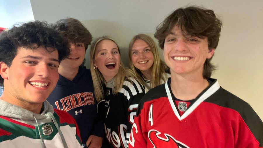 5 sophomore students celebrating the Devils season and success at the school