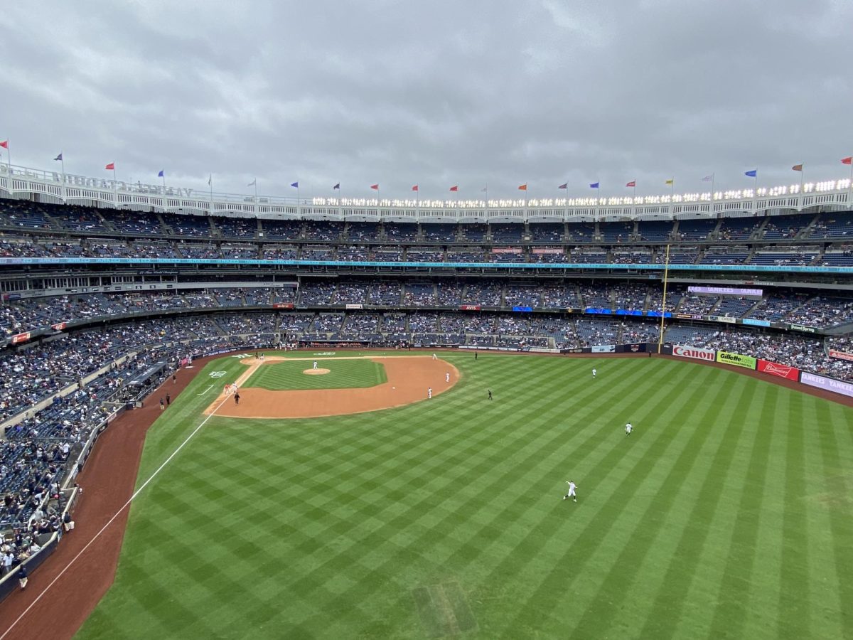 A+photo+of+Yankee+Stadium+full+of+excited+baseball+fans+