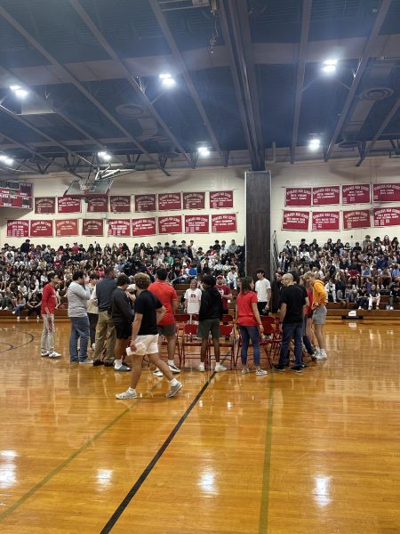BHS students and teachers play musical chairs at pep rally
