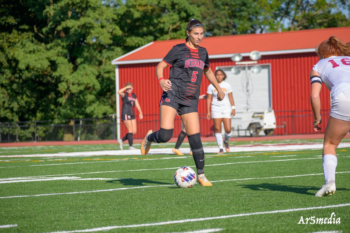 Sophomore Shannon Dill dribbling and looking to pass during a game against Vorhees.