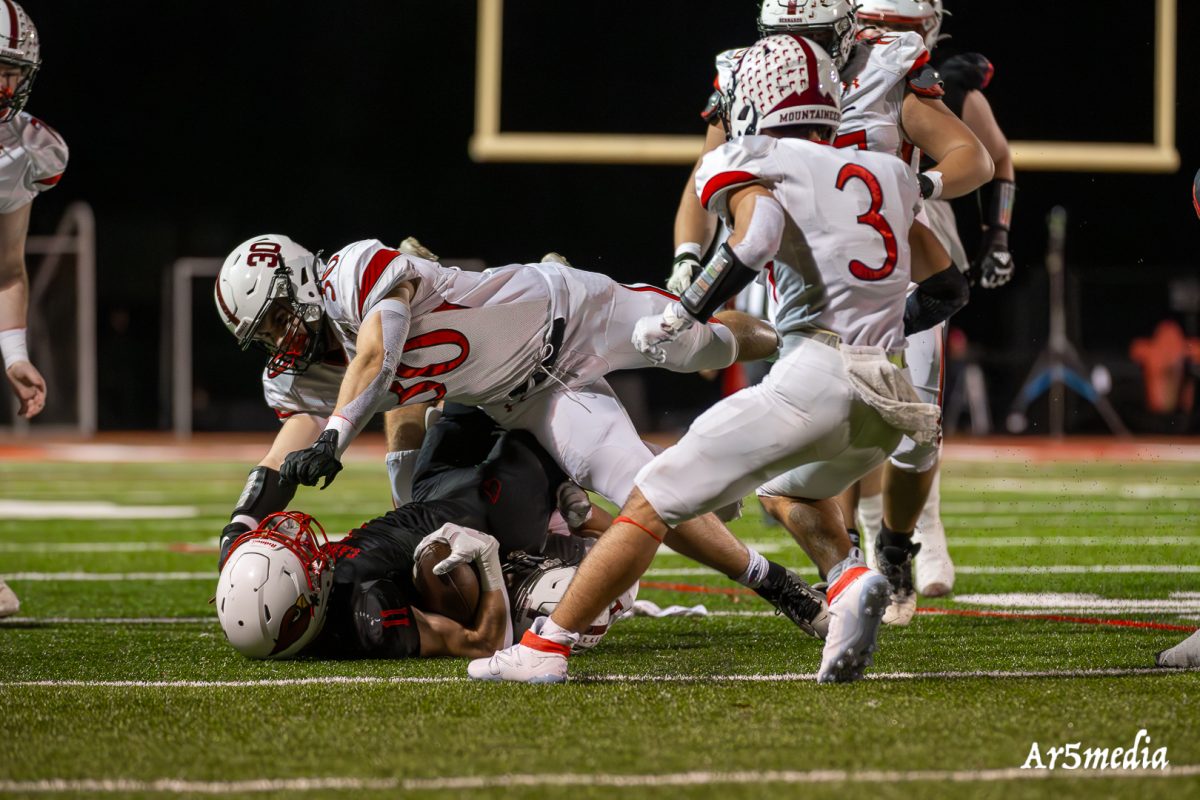 Junior Terrence Hanaratty delivering a huge hit during a game against westwood