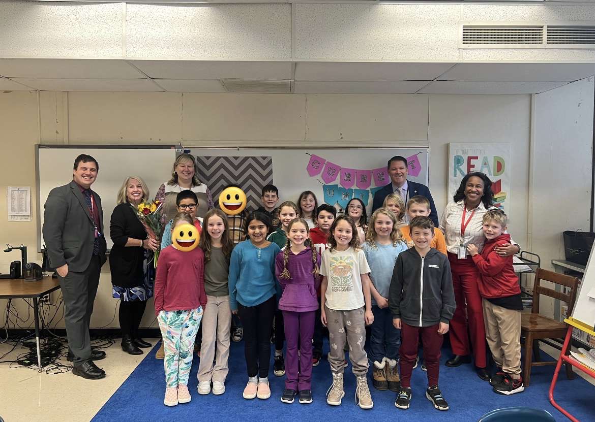 Mrs. Mariani and her current fourth grade class after receiving her award. 