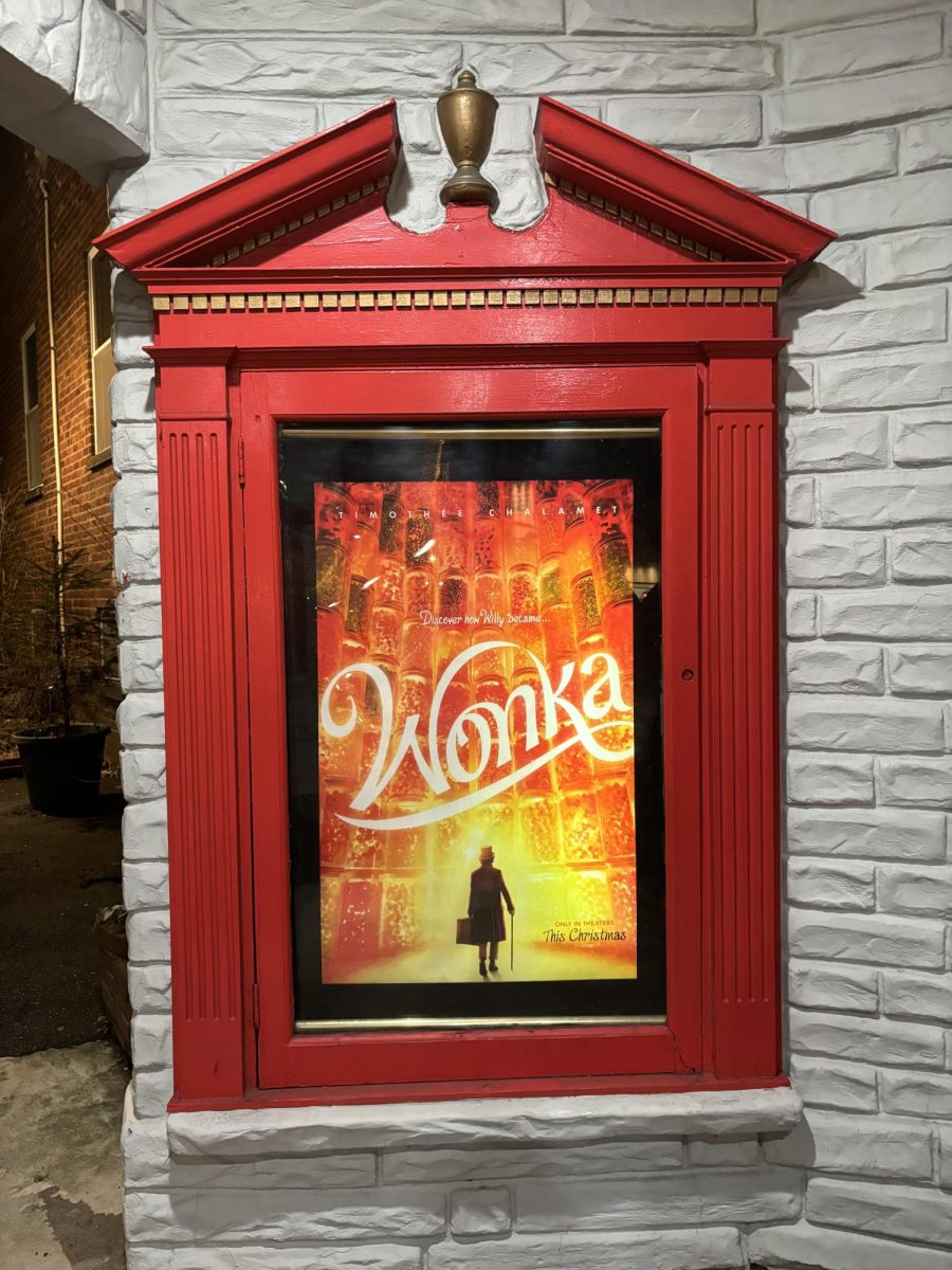 2023 film "Wonka" advertised outside movie theater