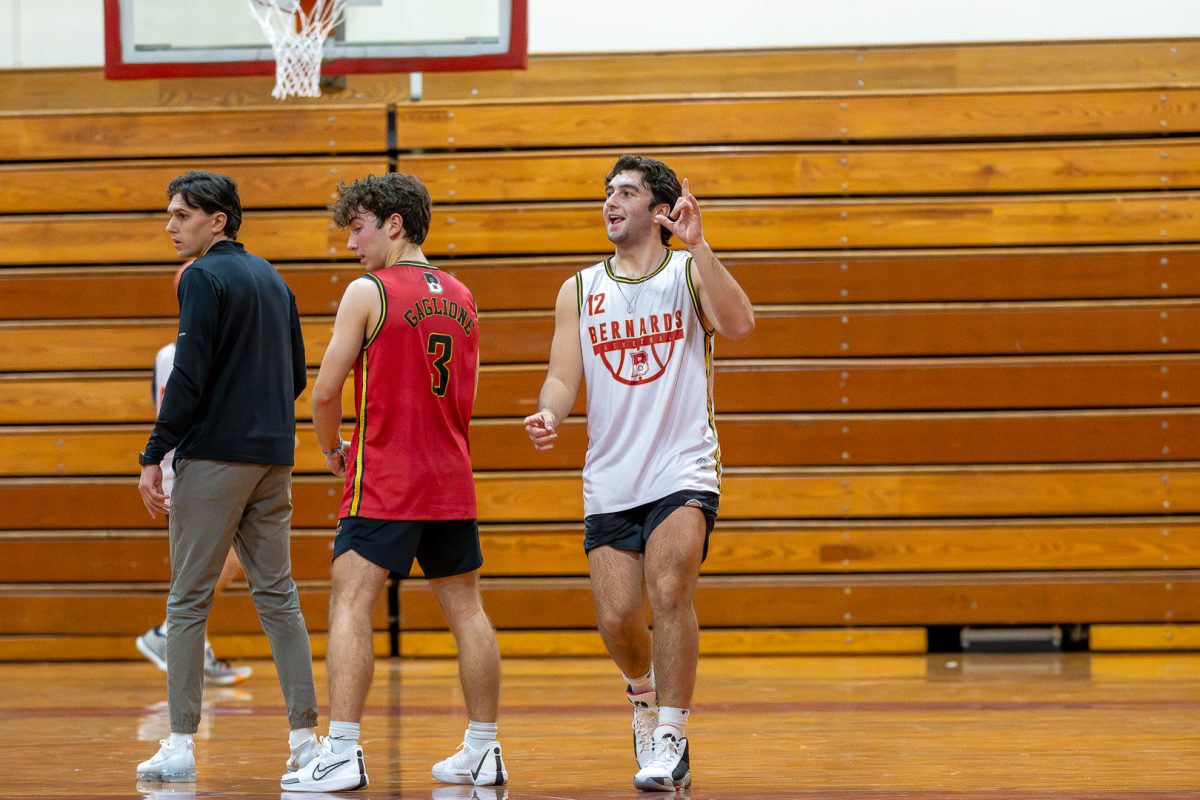 Boys Basketball team gets ready for their opening game against Manville.