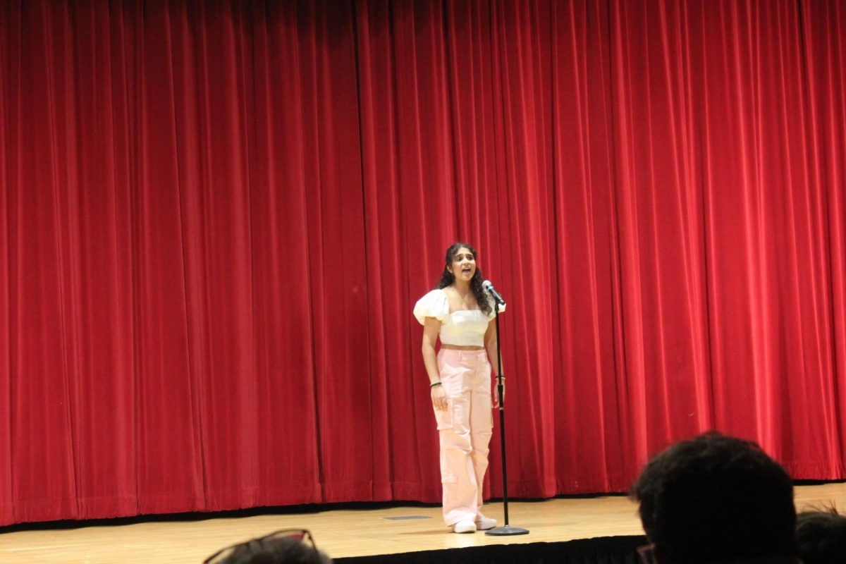 Performing Arts Club president Abby Sebastian performing at the Valentine's Cabaret