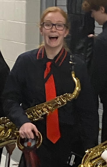 Mary is a member of the pit as an alto saxophonist