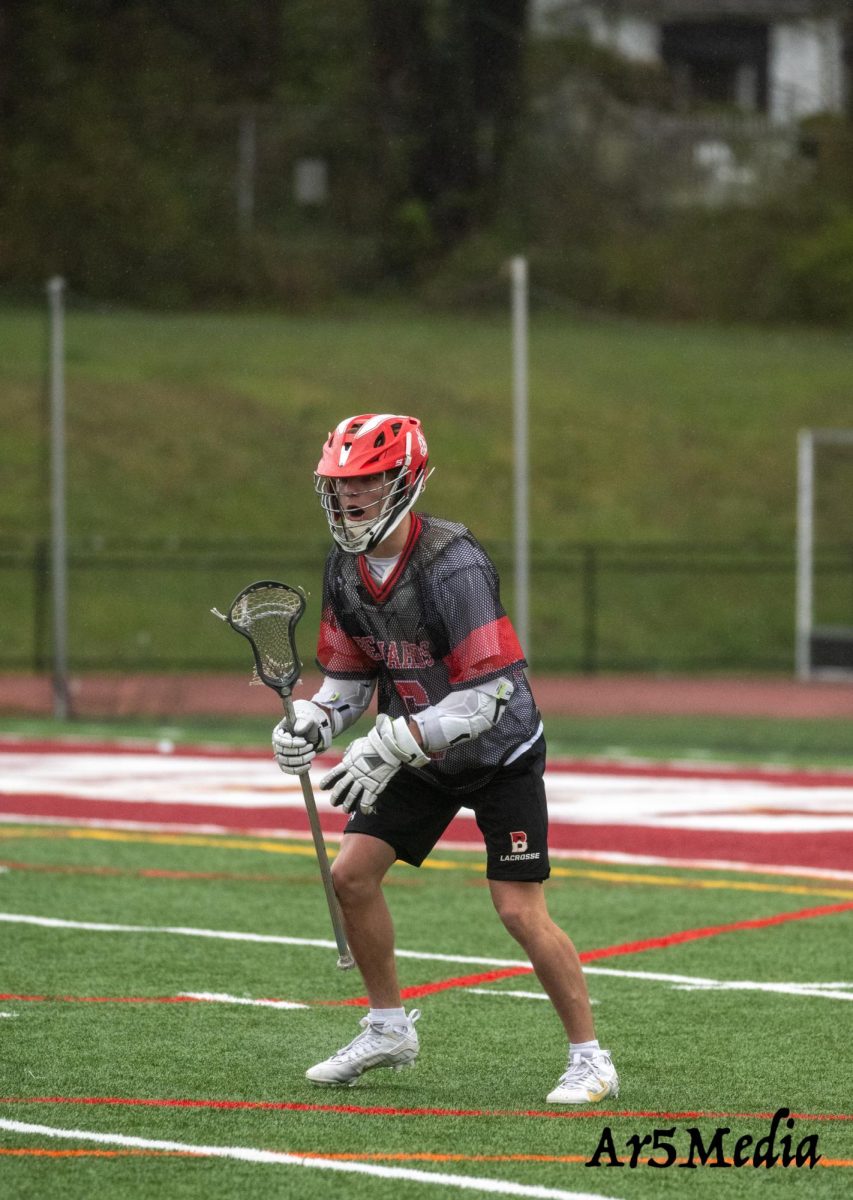 Senior Charlie Hunnewell celebrating after a goal against Somerville 