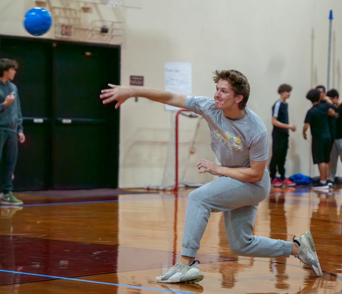 Logan Stevens '26 firing a dodgeball at the opposition during the tournament