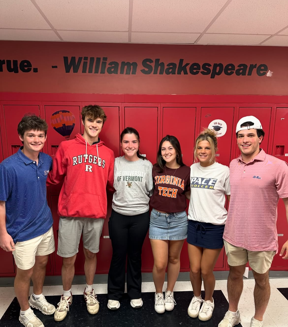 Seniors pose for a photo on decision day