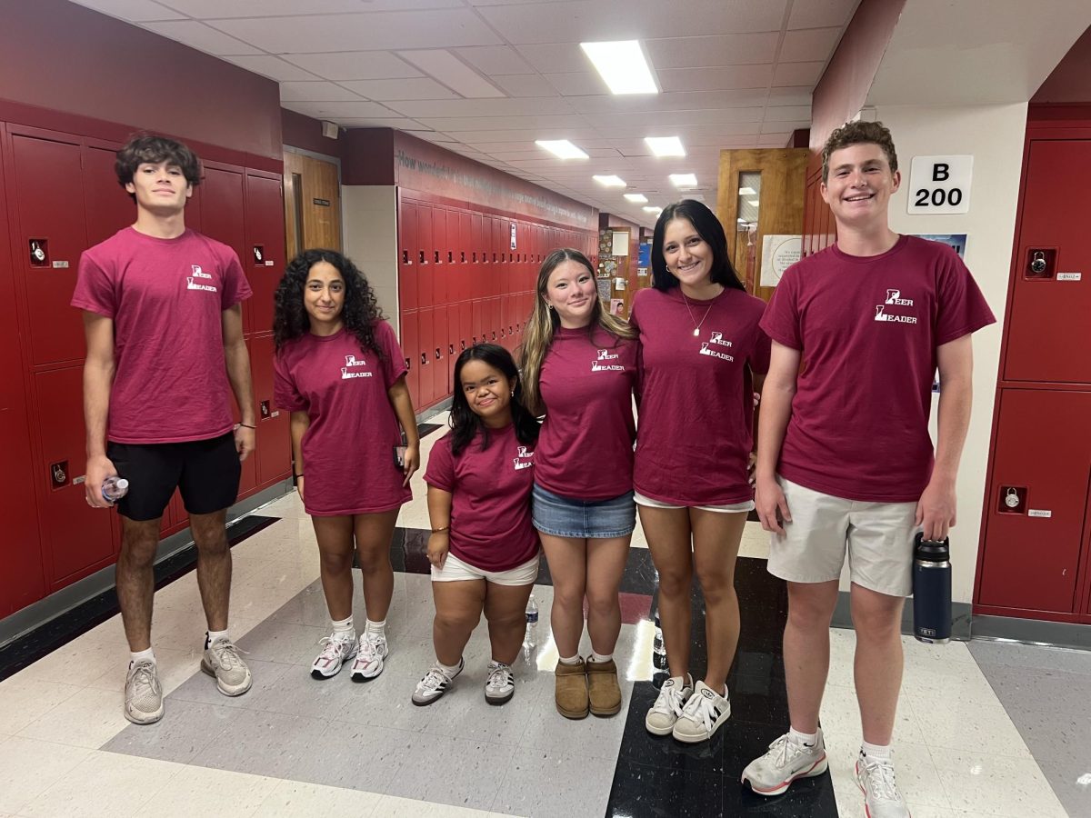 Peer Leaders pictured at Back to School Night, from left to right: Sean Arcelay '27, Juliette Raguso '26, Kristen Lee '27, Abby Wolkow '27, Kaia Alexander '26, Charlie Quinn '27