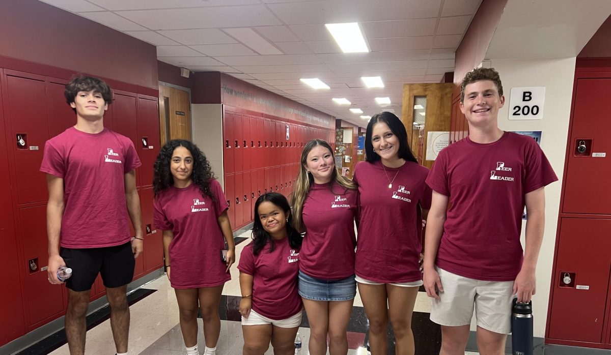 Peer Leaders pictured at Back to School Night, from left to right: Sean Arcelay '27, Juliette Raguso '26, Kristen Lee '27, Abby Wolkow '27, Kaia Alexander '26, Charlie Quinn '27