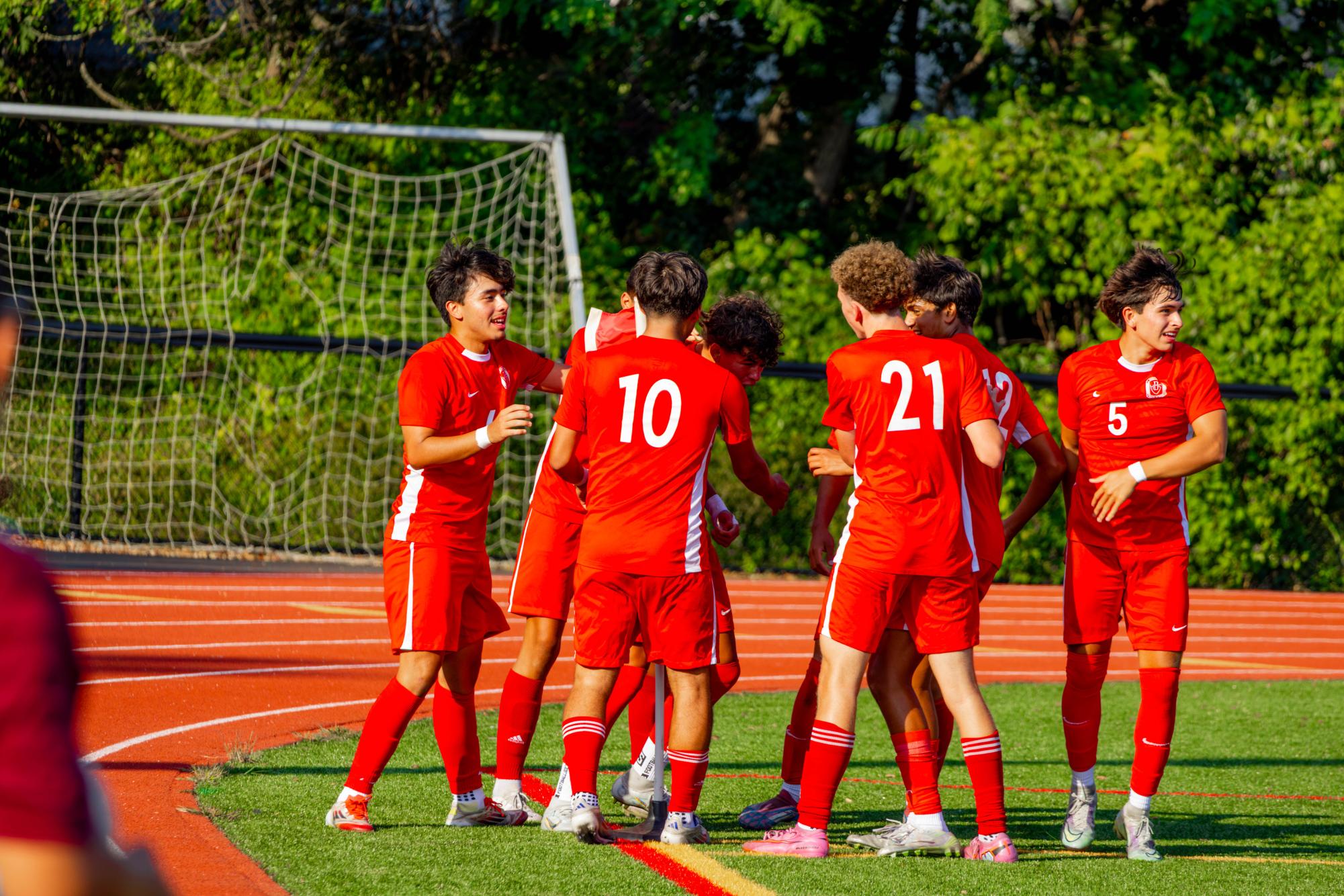 Boys soccer team celebrates en route to a big victory