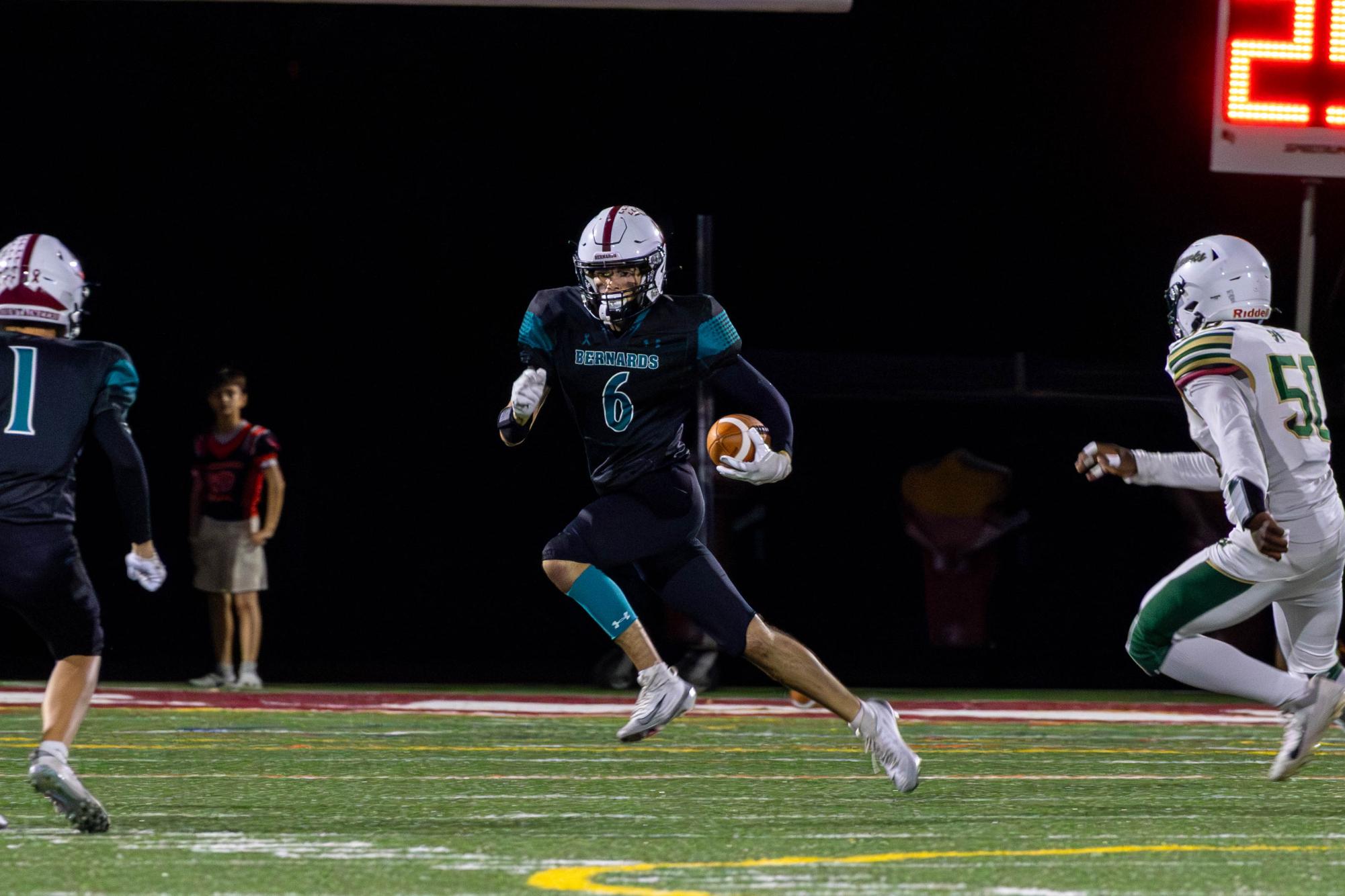 Sean Arcelay takes the ball up field during the "Teal Out" against JP Stevens