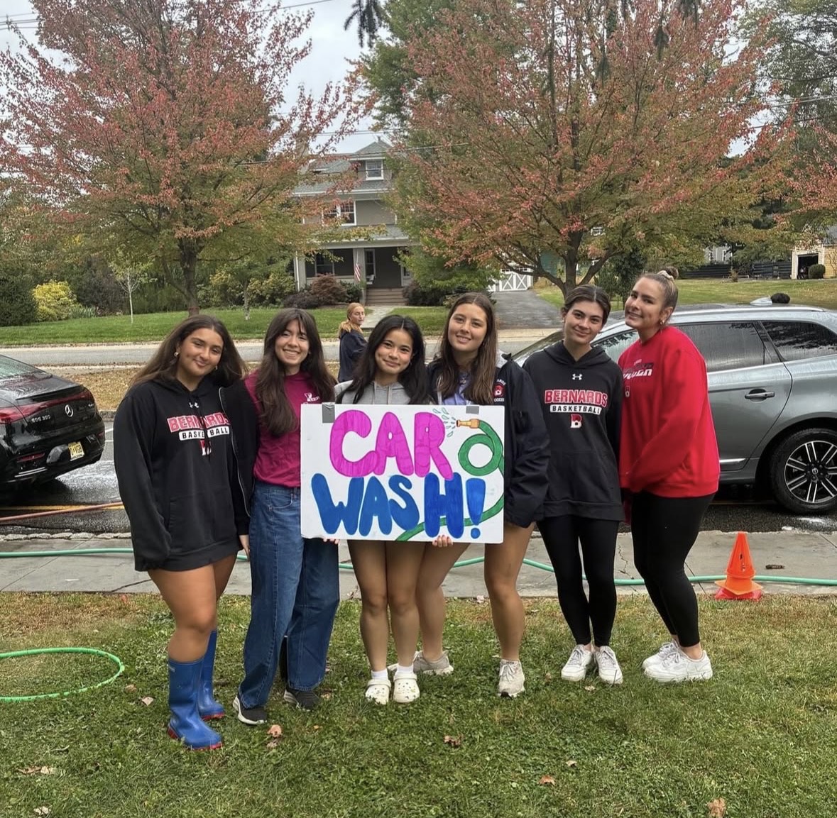 Members of the peer leader board posing for a photo during the car wash (used with permission of Justin Kaufman)