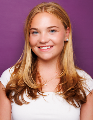 Julia poses for a headshot from one of her previous roles. 