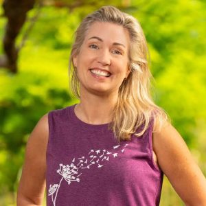 Chrissy poses for a headshot ahead of her first Survivor season
