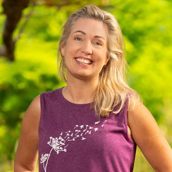 Chrissy poses for a headshot ahead of her first Survivor season